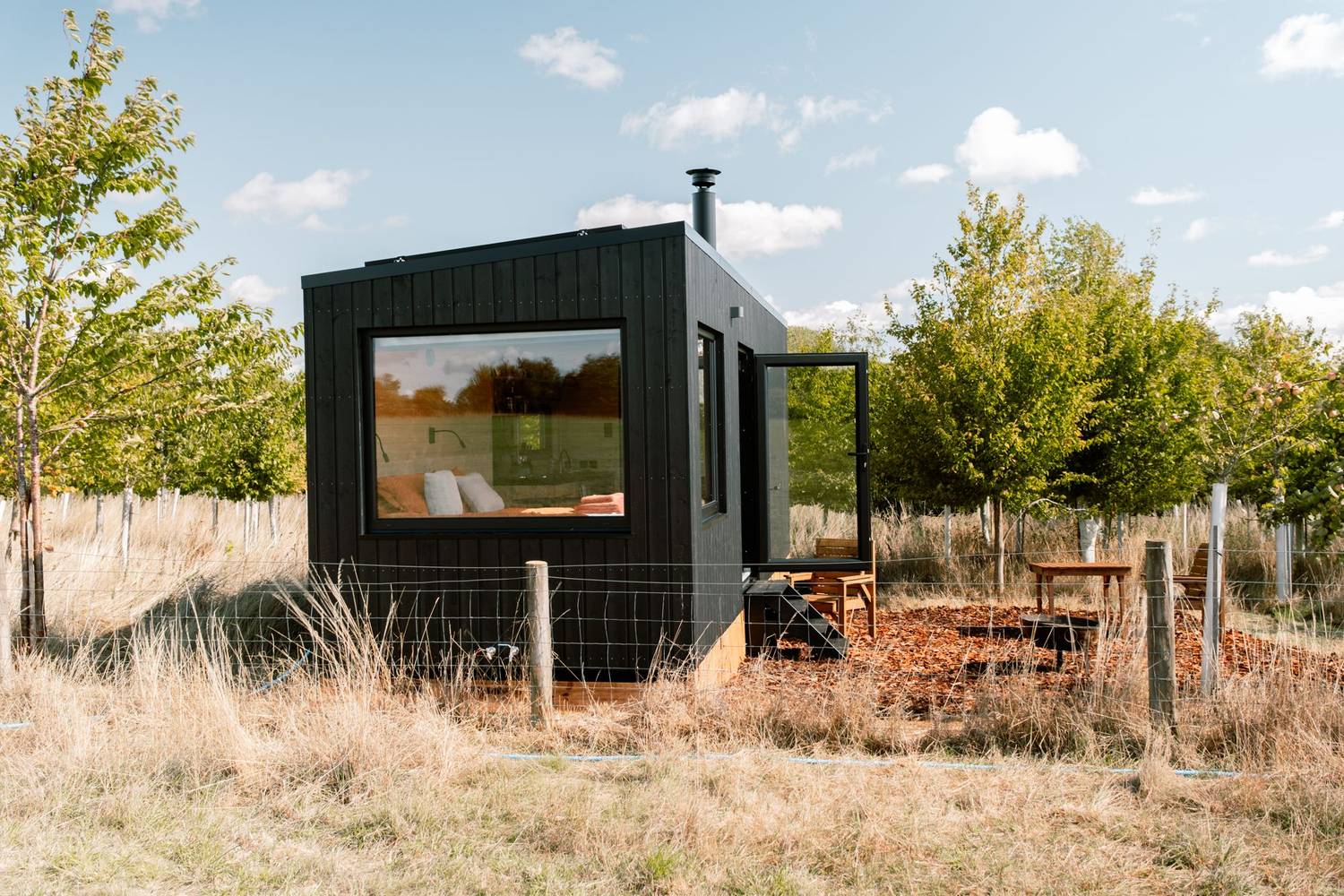 Cabin on a hillside with a view