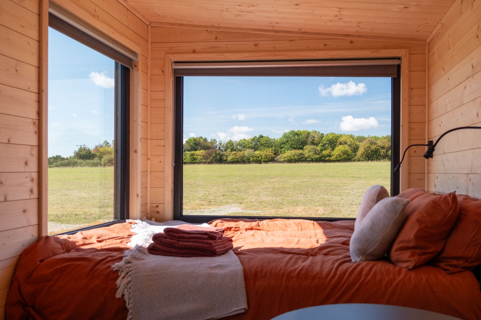 Cabin at the edge of a field